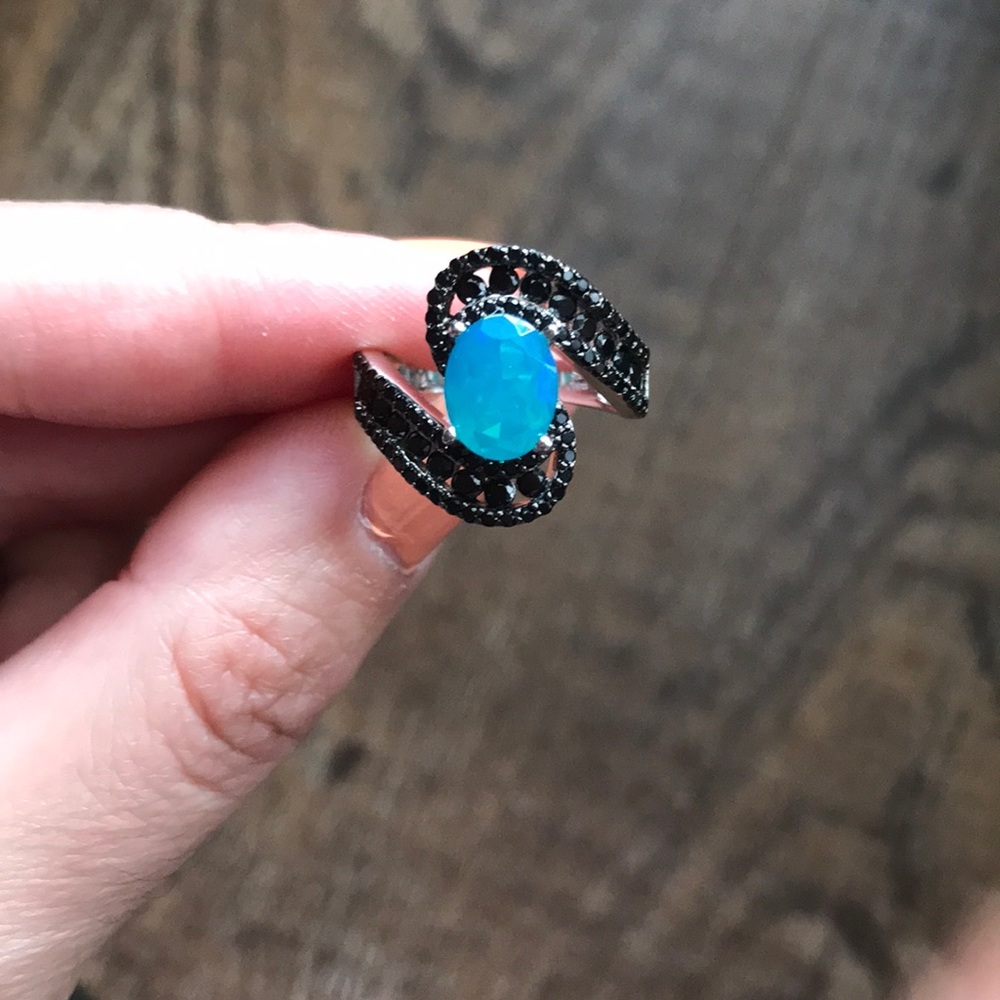 Blue opal and black spinel ring